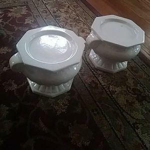 2 white ceramic plant holders